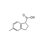 5-Methylindane-1-carboxylic Acid